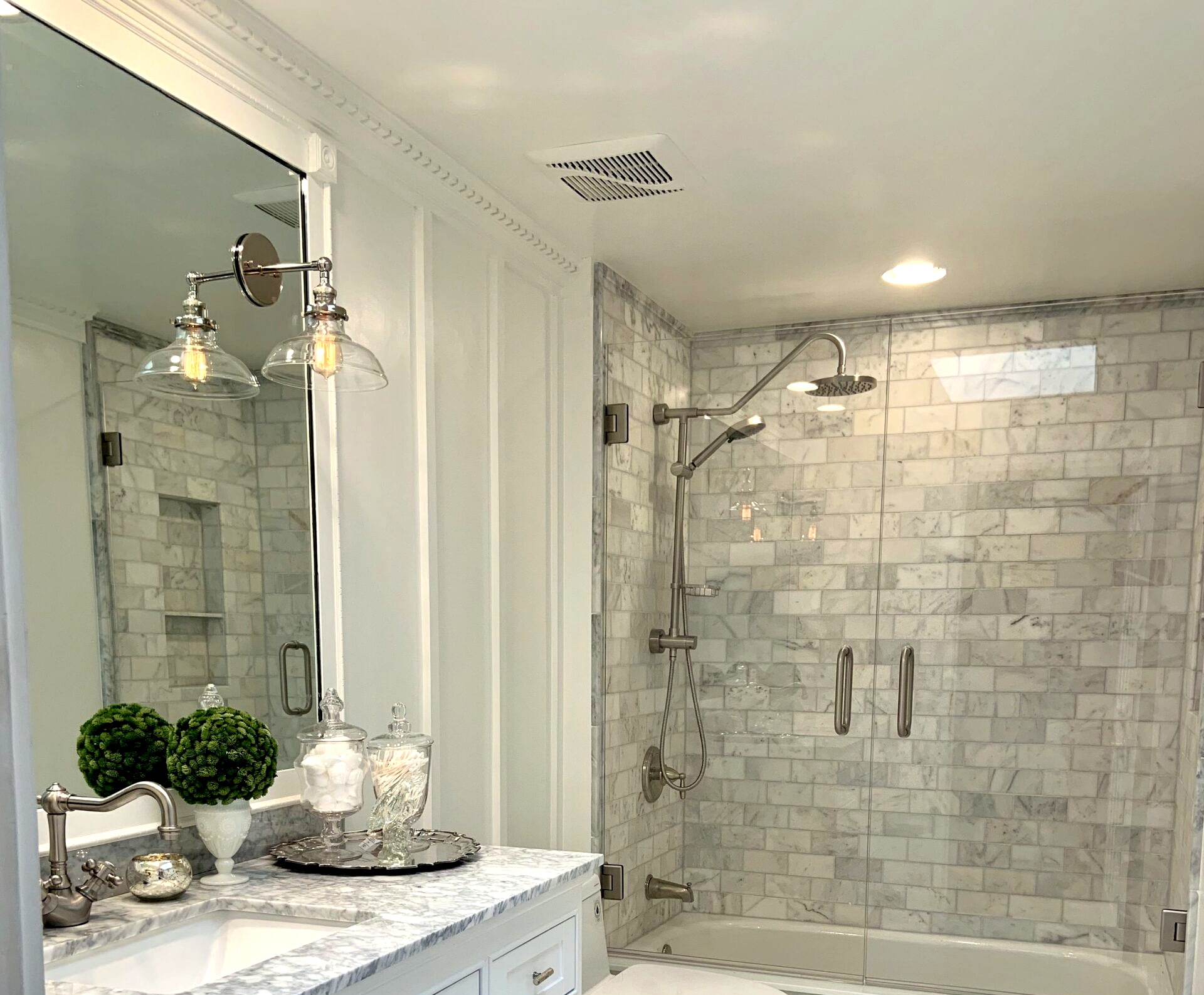 Clearview bathroom remodel — marble tile and custom vanity